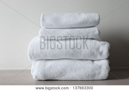 white towels on the table in the room