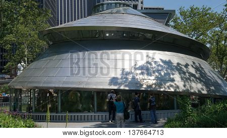 NEW YORK, NY - JUN 19: The SeaGlass Carousel at The Battery Park in New York, as seen on Jun 19, 2016. It is a new, state-of-the-art carousel featuring 30 large, luminescent fish.