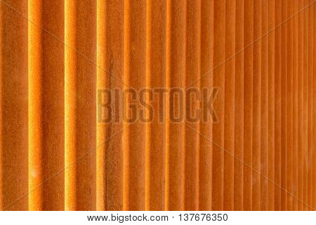 indistinct texture of rusty iron pipes of red color for a background