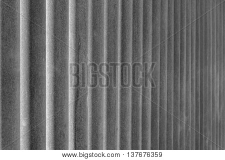indistinct texture of rusty iron pipes of gray color for a background