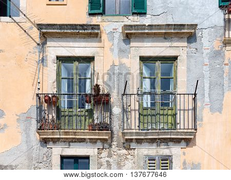 Old houses with balcony at Syracuse Sicily Italy