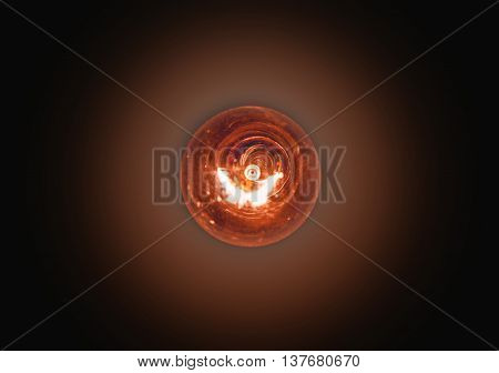 Light Bulb Lit On A Black Background