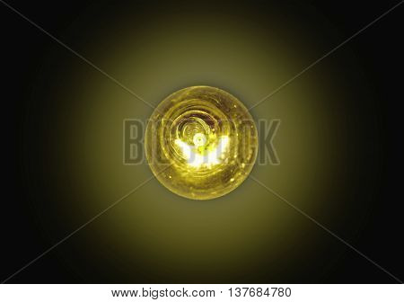 light bulb lit on a black backgroundsoft focus