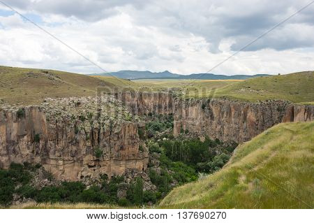 Ihlara Valley is a 16 km long gorge cut into volcanic rock in the southern part of Cappadocia Turkey