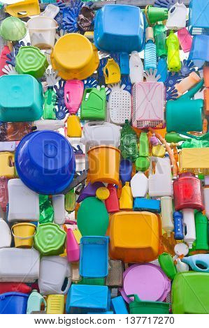 Background from plastic ware - bowls bottles buckets canisters etc.