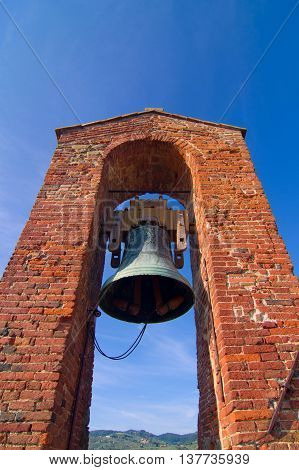 brick tower with bells ringing to tell the time