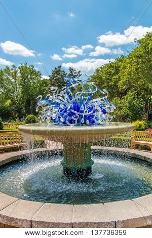ATLANTA GA USA - APRIL 23 2016: Exhibition of glass artist Chihuly takes place in the Atlanta Botanical Garden in Atlanta Georgia in 2016.