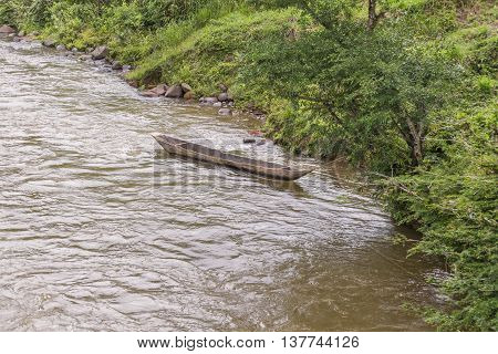 Wooden Boat At Riverfron In Ecuadorian Amazonia