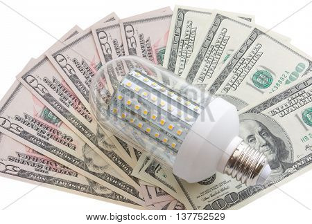 Led light and dollars. . The concept of energy saving