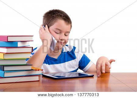 Young Tween Boy Chatting On A Mobile Phone