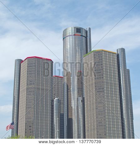 DETROIT - July 7, 2016. Interconnected towers of the Renaissance Center, located in downtown Detroit, are seen reaching into a partly blue sky. Built in 1977, the RenCen, as it is often called, is the tallest building in Michigan.