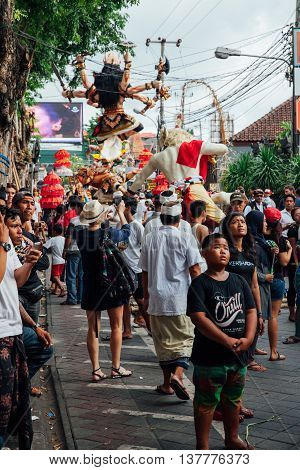 Visitors Watch And Take Photo Of The Ogoh-ogoh Statues At The Parade, Kuta, Bali