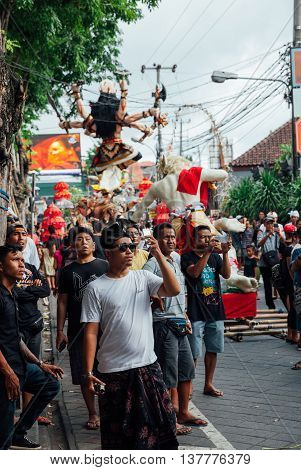 Visitors Take Photo Of The Ogoh-ogoh Statues At The Parade, Kuta, Bali