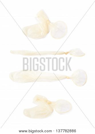 Used lated condom isolated over the white background, set of four different foreshortenings