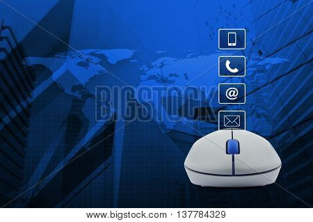 Wireless computer mouse with telephone mobile phone at and email buttons over map and city tower background Customer support concept Elements of this image furnished by NASA