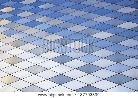 Abstract architectural pattern. Metal texture background. Colored metal plates.
