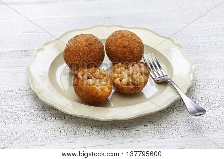 arancini di riso, fried risotto rice balls, italian sicilian food