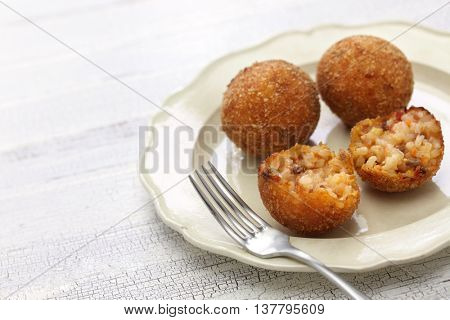 arancini di riso, fried risotto rice balls, italian sicilian food