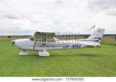 Zhitomir Ukraine - July 31 2011: Cessna 172 Skyhawk parked on the grass airfield