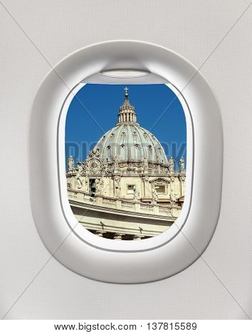 Looking Out The Window Of A Plane To The Basilica