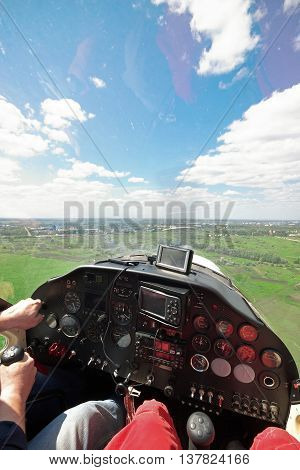Pilots flying a leisure flight on a light plane