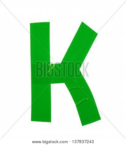 Letter K symbol made of insulating tape pieces, isolated over the white background