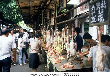 GUANGZHOU / CHINA - CIRCA 1987: Freshly butchered ducks and chickens are available for sale in Guangzhou's Qingping Market.