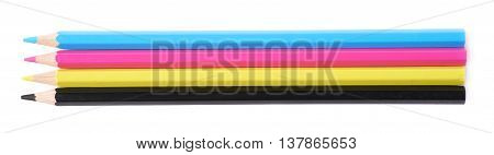 Four cmyk colored drawing pencils composition isolated over the white background
