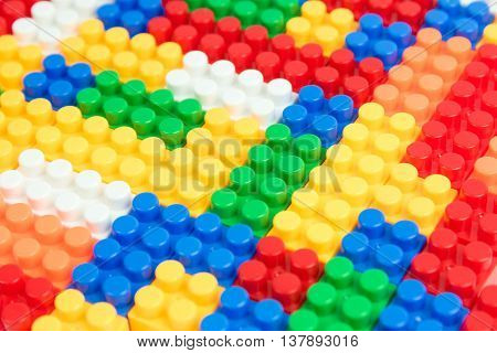 Close up photo of colorful plastic building block toy for children