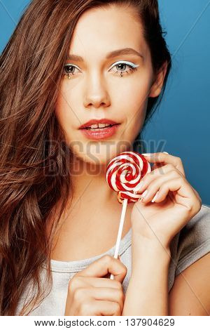 young pretty adorable woman with candy close up like doll makeup