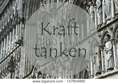 Church Of Trondheim In Norway. Macro Or Close Up Of Sculptures Or Statue. Religious Greeting Card. German Text Kraft Tanken Means Relax