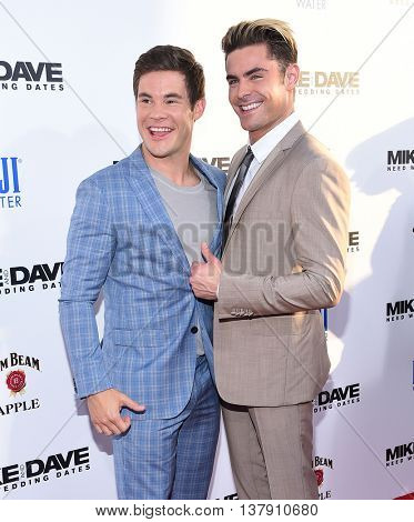 LOS ANGELES - JUN 29:  Adam Devine & Zac Efron arrives to the 