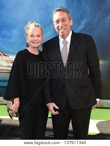 LOS ANGELES - JUL 9:  Ivan Reitman & Genevieve Robert arrives to the 