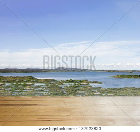 Wood Table Top And Lake Or Reservoir View