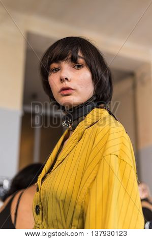 MILAN ITALY - JUNE 19: Beautiful model poses in the backstage just before Damir Doma SS 17 show during Milan Men's Fashion Week on JUNE 19 2016 in Milan.