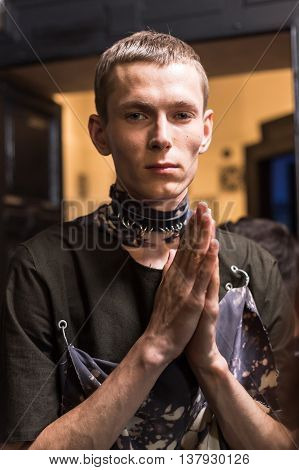 MILAN ITALY - JUNE 19: Beautiful model poses in the backstage just before Damir Doma SS 17 show during Milan Men's Fashion Week on JUNE 19 2016 in Milan.