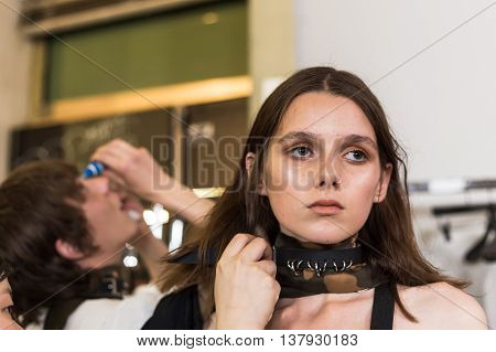 MILAN ITALY - JUNE 19: Beautiful model poses in the backstage just before Damir Doma SS 17 show during Milan Men's Fashion Week on JUNE 19 2016 in Milan.