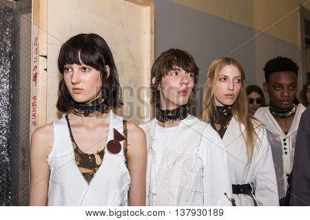 MILAN ITALY - JUNE 19: Beautiful models pose in the backstage just before Damir Doma SS 17 show during Milan Men's Fashion Week on JUNE 19 2016 in Milan.