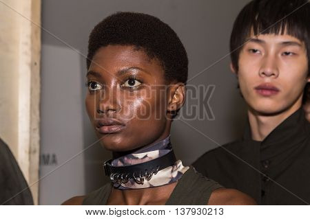 MILAN ITALY - JUNE 19: Beautiful models pose in the backstage just before Damir Doma SS 17 show during Milan Men's Fashion Week on JUNE 19 2016 in Milan.