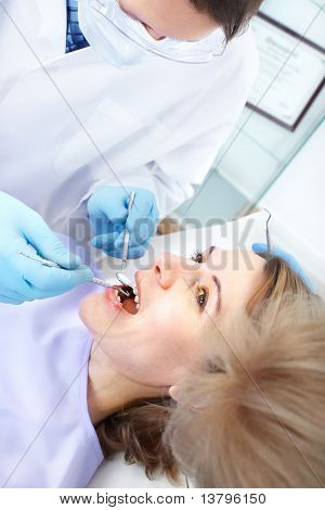 Arzt Zahnarzt und Patienten Frau