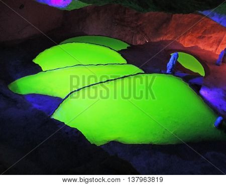 Cave Can Merca, Ibiza Island. Illuminated pools inside of a dripstone cave.