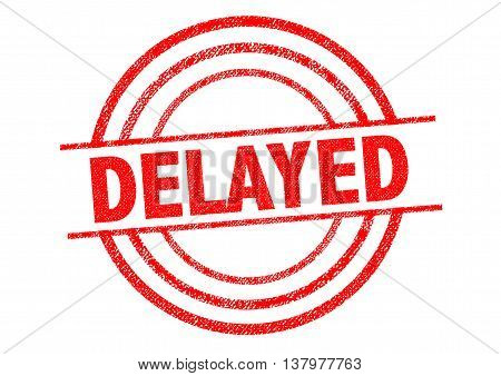 DELAYED red Rubber Stamp over a white background.