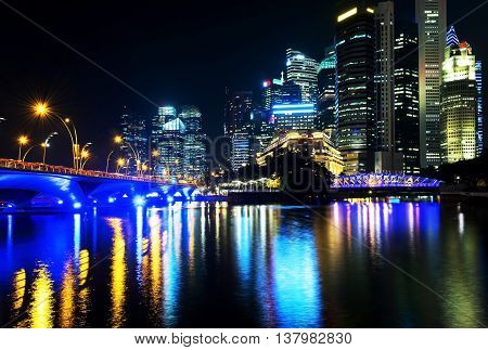 Beautiful skyscrapers and reflections at night of the big central business city.