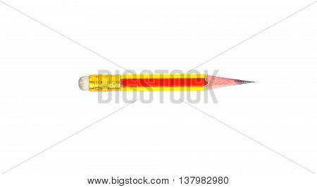 Short wooden pencil used isolated on white background.