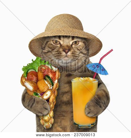 The Cat In A Straw Hat Holds A Glass Of Juice And The Chicken Nuggets With Bubble Waffles. White Bac
