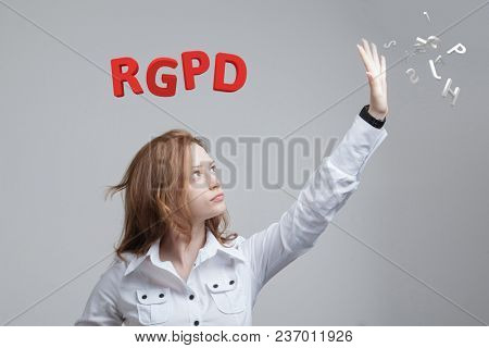 RGPD, Spanish, French and Italian version version of GDPR: Reglamento General de Proteccion de datos. General Data Protection Regulation. Young woman working with information.