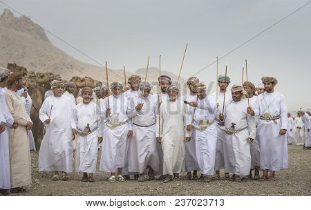 Omani Men Dancing And Singing To Celebrate A Successful Race
