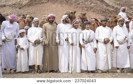 Omani Men With Their Camels