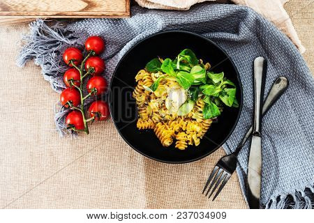 Radiatori pasta in a creamy tomato parmesan cheese sauce