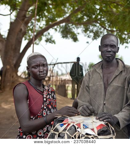 JUBA, SOUTH SUDAN-JUNE 22, 2012: Portrait of unidentified Mundari tribespeople north of Juba, South Sudan, in this illustrative editorial.